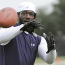 Houston Texans' Ed Reed reaches to make a catch during NFL football training camp Friday, July 26, 2013, in Houston. (AP Photo/Pat Sullivan)