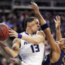 Kansas State guard Angel Rodriguez (13) is covered by La Salle guard Tyreek Duren (3) during the first half of a second-round game in the NCAA college basketball tournament at the Sprint Center in Kansas City, Mo., Friday, March 22, 2013. (AP Photo/Orlin Wagner)
