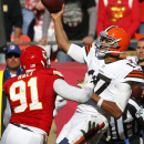 Cleveland Browns quarterback Jason Campbell (17) throws under pressure from Kansas City Chiefs outside linebacker Tamba Hali (91) during the second half of an NFL football game in Kansas City, Mo., Sunday, Oct. 27, 2013. (AP Photo/Colin E. Braley)