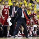 Indiana coach Tom Crean directs his team from the bench during the second half of an NCAA college basketball game against Michigan Sunday, March 10, 2013, in Ann Arbor, Mich. Indiana came from behind to defeat Michigan 72071 and capture their first outright Big Ten title in two decades. (AP Photo/Duane Burleson)