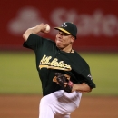 Oakland Athletics pitcher Barolo Colon releases a pitch during the fifth inning of the baseball game against the Anaheim Angels, Friday July 26, 2013, in Oakland, Calif. (AP Photo/Beck Diefenbach)