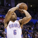 Oklahoma City Thunder guard Derek Fisher shoots against the New Orleans Hornets during the second quarter of an NBA basketball game in Oklahoma City, Wednesday, Feb. 27, 2013. (AP Photo/Alonzo Adams)