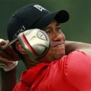 Tiger Woods hits off the ninth tee during the final round of the AT&T National golf tournament at Congressional Country Club in Bethesda, Maryland July 1, 2012. REUTERS/Kevin Lamarque
