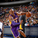 DALLAS, TX - FEBRUARY 24: Kobe Bryant #24 of the Los Angeles Lakers drives against the Dallas Mavericks on February 24, 2013 at the American Airlines Center in Dallas, Texas. (Photo by Glenn James/NBAE via Getty Images)