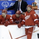 Detroit Red Wings players watch from the bench against the Chicago Blackhawks during the third period in Game 6 of the Western Conference semifinals in the NHL hockey Stanley Cup playoffs in Detroit, Monday, May 27, 2013. Chicago won 4-3. (AP Photo/Paul Sancya)