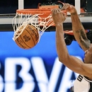 Team Chuck's Kawhi Leonard of the San Antonio Spurs dunks against Team Shaq during the first half of the Rising Stars Challenge basketball game at NBA All-Star Weekend Friday, Feb. 15, 2013, in Houston. (AP Photo/Eric Gay)
