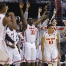 Ohio State players celebrate a 3-point shot against Arizona by LaQuinton Ross (10) during the second half of a West Regional semifinal in the NCAA men's college basketball tournament, Thursday, March 28, 2013, in Los Angeles. (AP Photo/Jae C. Hong)