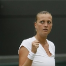 Petra Kvitova of Czech Republic reacts after scoring a point to Ekaterina Makarova of Russia during their Women's singles match at the All England Lawn Tennis Championships in Wimbledon, London, Friday, June 28, 2013. (AP Photo/Kirsty Wigglesworth)
