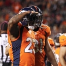Denver Broncos running back Willis McGahee (23) reacts after scoring a touchdown against the New Orleans Saints in the first quarter of an NFL football game, Sunday, Oct. 28, 2012, in Denver. (AP Photo/David Zalubowski)