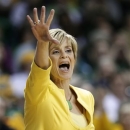 FILE - In this Jan. 19, 2013, file photo, Baylor head coach Kim Mulkey instructs her team in the first half of an NCAA college basketball game against West Virginia in Waco, Texas. (AP Photo/Tony Gutierrez, File)