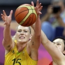 FILE - In this Aug. 7, 2012 file photo, China's Gao Song, right, tries stop Australia's Lauren Jackson during their women's quarterfinal basketball game at the 2012 Summer Olympics in London. Basketball Australia says Seattle Storm forward Jackson is expected to make a full recovery from a persistent right hamstring injury after undergoing surgery in Melbourne this week. Orthopedic surgeon David Young was quoted in a statement Thursday, Jan. 10, 2013 said Jackson's the surgery was 