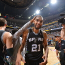 MEMPHIS, TN - MAY 27: Tim Duncan #21 of the San Antonio Spurs smiles as he walks into the lockerroom after winning the game against the Memphis Grizzlies after Game Four of the Western Conference Finals during the 2013 NBA Playoffs on May 27, 2013 at FedEx Forum in Memphis, Tennessee. (Photo by Jesse D. Garrabrant/NBAE via Getty Images)