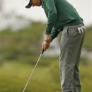 Nicolas Colsaerts of Belgium putts on the 6th hole during the Volvo World Match Play Golf Championship tournament against Justin Rose of South Africa in Casares, southern Spain, Saturday, May 19, 2012. (AP Photo/Sergio Torres)