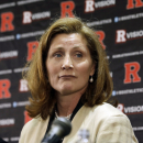 Julie Hermann listens during a news conference where she was introduced as the new athletic director at Rutgers University on Wednesday, May 15, 2013, in Piscataway, N.J.  Hermann was a senior associate athletic director and senior woman administrator at the University of Louisville. Rutgers has been looking for a new AD since Tim Pernetti resigned on April 5, part of the fallout from the Mike Rice scandal. (AP Photo/Mel Evans)