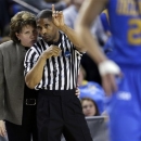 Delaware head coach Tina Martin, left, speaks with an official during a pause in play in the first half of a second-round game against North Carolina in the women's NCAA college basketball tournament in Newark, Del., Tuesday, March 26, 2013. (AP Photo/Patrick Semansky)