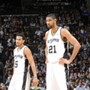 SAN ANTONIO, TX - MARCH 8: Cory Joseph #5 and Tim Duncan #21of the San Antonio Spurs look on against the Portland Trail Blazers on MARCH 8, 2013 at the AT&T Center in San Antonio, Texas
