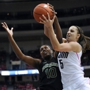 Baylor's Destiny Williams, left, and Connecticut's Caroline Doty, right, fight for control of the ball during the first half of an NCAA college basketball game in Hartford, Conn., Monday, Feb. 18, 2013. (AP Photo/Jessica Hill)