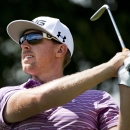 Hunter Mahan watches his tee shot on the seventh hole in the second round of the Canadian Open golf tournament at Glen Abbey in Oakville, Ontario, on Friday, July 26, 2013. (AP Photo/The Canadian Press, Nathan Denette)