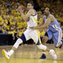 Golden State Warriors' Stephen Curry, left, drives the ball past Denver Nuggets' Andre Miller during the second half of Game 4 in a first-round NBA basketball playoff series on Sunday, April 28, 2013, in Oakland, Calif. (AP Photo/Ben Margot)