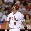 Los Angeles Angels' Albert Pujols reacts after he struck out during the ninth inning of a baseball game against the Minnesota Twins on Monday, July 22, 2013, in Anaheim, Calif. The Twins won 4-3. (AP Photo/Jae C. Hong)