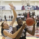 Gonzaga's Sam Dower, right, is fouled by Loyola Marymount forward Marin Mornar during the first half of an NCAA college basketball game, Thursday, Jan. 31, 2013, in Los Angeles. (AP Photo/Mark J. Terrill)