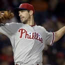 Philadelphia Phillies starting pitcher Cliff Lee fires one in against the Boston Red Sox during the seventh inning of an interleague baseball game at Fenway Park in Boston, Tuesday, May 28, 2013. (AP Photo/Elise Amendola)
