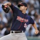 Minnesota Twins starter Scott Diamond delivers a pitch to the Chicago White Sox in the second inning of a baseball game in Chicago, Wednesday, May, 23, 2012. (AP Photo/Paul Beaty)