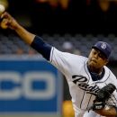 San Diego Padres starting pitcher Edinson Volquez delivers to the Washington Nationals during the first inning of a baseball game on Thursday, April 26, 2012, in San Diego. (AP Photo/Lenny Ignelzi)