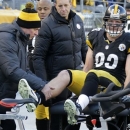 Pittsburgh Steelers tight end Heath Miller is examined by a team doctor late in the fourth quarter of an NFL football game against the Cincinnati Bengals in Pittsburgh, Sunday, Dec. 23, 2012. Miller left the game, which the Bengals won 13-10. (AP Photo/Gene J. Puskar)