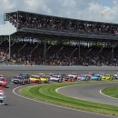 Sprint Cup Series driver Ryan Newman (39) leads the field into the first turn for the start of the Brickyard 400 auto race at the Indianapolis Motor Speedway in Indianapolis, Sunday, July 28, 2013. (AP Photo/Doug McSchooler)