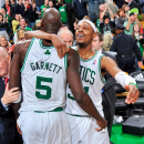 BOSTON, MA - FEBRUARY 10:  Paul Pierce #34 of the Boston Celtics hugs teammate Kevin Garnett #5 after their team's triple overtime victory against the Denver Nuggets on February 10, 2013 at the TD Garden in Boston, Massachusetts.  (Photo by Steve Babineau/NBAE via Getty Images)