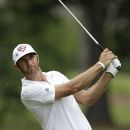 Dustin Johnson watches his shot from the 15th fairway during the final round of the St. Jude Classic golf tournament, Sunday, June 10, 2012, in Memphis, Tenn. Johnson won the tournament at 9 under par. (AP Photo/Mark Humphrey)