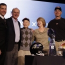 San Francisco 49ers head coach Jim Harbaugh and Baltimore Ravens head coach John Harbaugh pose with parents Jack and Jackie and grandfather Joe Cipiti during a news conference for the NFL Super Bowl XLVII football game Friday, Feb. 1, 2013, in New Orleans. (AP Photo/Mark Humphrey)