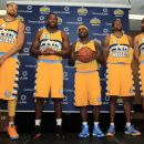 From left, Denver Nuggets' JaVale McGee, Kenneth Faried, Ty Lawson, Andre Iguodala and Danilo Gallinari, of Italy, wear the team's alternate home uniform before their NBA basketball media day in Denver, Monday, Oct. 1, 2012. (AP Photo/David Zalubowski)