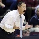 FILE - In this Jan. 17, 2013 file photo, Rutgers head coach Mike Rice reacts to play during the first half of an NCAA college basketball game against South Florida in Piscataway, N.J. Rutgers has fired Rice after a videotape aired showing him shoving, grabbing and throwing balls at players in practice and using gay slurs during practice. With mounting criticism on a state and national level, the school decided to take action on Wednesday, April 3, 2013. relieving Rice of his duties after three largely unsuccessful seasons at the Big East school. (AP Photo/Mel Evans, File)