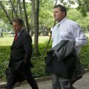 Former Major League Baseball pitcher Roger Clemens, right, arrives at federal court in Washington, Wednesday, May 23, 2012. (AP Photo/Manuel Balce Ceneta)