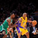 LOS ANGELES, CA - FEBRUARY 20: Kobe Bryant #24 of the Los Angeles Lakers posts up against Jeff Green #8 of the Boston Celtics at Staples Center on February 20, 2013 in Los Angeles, California. (Photo by Noah Graham/NBAE via Getty Images)