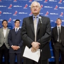 Donald Fehr, left, executive director of the NHL players' association, talks to reporters following collective bargaining talks between the NHLPA and the NHL in Toronto on Thursday, Oct. 18, 2012. Players, from left, Detroit Red Wings' Daniel Cleary, Edmonton Oilers' Shawn Horcoff, Pittsburgh Penguins' Sidney Crosby, Carolina Hurricanes' Eric Staal and Phoenix Coyotes' Shane Doan listen in the background. (AP Photo/The Canadian Press, Chris Young)