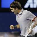 Switzerland's Roger Federer reacts after winning the second set of his men's semifinal against Britain's Andy Murray at the Australian Open tennis championship in Melbourne, Australia, Friday, Jan. 25, 2013. (AP Photo/Andy Wong)