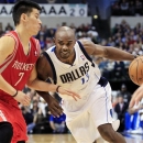 Dallas Mavericks point guard Mike James (13) tries to get around Houston Rockets guard Jeremy Lin (7) during the fourth quarter of a NBA basketball game, Wednesday, Jan. 16, 2013, in Dallas. The Mavericks won 105-100. (AP Photo/John F. Rhodes)