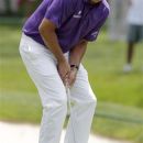 Phil Mickelson reacts to missing a putt on the third hole during the first round of the Memorial golf tournament Thursday, May 31, 2012, in Dublin, Ohio.  (AP Photo/Jay LaPrete)