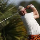 John Daly of the U.S. hits his tee shot on the third hole during the first round of the PGA Championship golf tournament at The Ocean Course on Kiawah Island, South Carolina, August 9, 2012. REUTERS/Mathieu Belanger