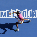 Rafael Nadal of Spain casts a shadow on the court as he plays his fourth round match against Kevin Anderson of South Africa at the Australian Open tennis championship in Melbourne, Australia, Sunday, Jan. 25, 2015. (AP Photo/Lee Jin-man)