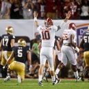 Alabama's AJ McCarron reacts to a touchdown run by Eddie Lacy during the first half of the BCS National Championship college football game against Notre Dame Monday, Jan. 7, 2013, in Miami. (AP Photo/John Bazemore)
