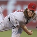 Los Angeles Angels' Jered Weaver works against the Oakland Athletics in the first inning of a baseball game Monday, Aug. 6, 2012, in Oakland, Calif. (AP Photo/Ben Margot)