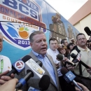 Notre Dame head coach Brian Kelly talks to reporters after arriving in Fort Lauderdale, Fla., Wednesday, Jan. 2, 2013. Notre Dame takes on Alabama in the BCS national championship NCAA college football game next Monday in Miami. (AP Photo/Alan Diaz)