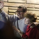 FILE - In this Nov. 9, 2011 file photo, former Penn State Coach Joe Paterno and his wife, Sue Paterno, stand on their porch to thank supporters gathered outside their home in State College, Pa. Sue Paterno says the family's detailed response to a critical report on the handling of child abuse allegations against former assistant coach Jerry Sandusky is being released to the public. (AP Photo/Gene J. Puskar, File)