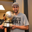 MEMPHIS, TN - MAY 27: Manu Ginobili #20 of the San Antonio Spurs poses with the trophy in the lockeroom after the Win against the Memphis Grizzlies in Game Four of the Western Conference Finals during the 2013 NBA Playoffs on May 27, 2013 at FedEx Forum in Memphis, Tennessee. (Photo by Jesse D. Garrabrant/NBAE via Getty Images)