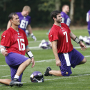 Minnesota Vikings' quarterback Christian Ponder, right, and quarterback Matt Cassel, left, warm up during their football practice at the Grove Hotel in Watford, England, Wednesday, Sept. 25, 2013. The Vikings play Pittsburgh Steelers on Sunday in a NFL football game at Wembley Stadium in London. (AP Photo/Sang Tan)