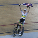 Annette Edmondson of Australia, celebrates her win after the final of theWomen's Omnium at the Track Cycling World Championships in Saint-Quentin-en-Yvelines, outside Paris, France, Sunday, Feb. 22, 2015. Annette Edmondson of Australia won gold Kirsten Wild of the Netherlands won silver and Laura Trott of Great Britain won bronze. (AP Photo/Michel Euler)